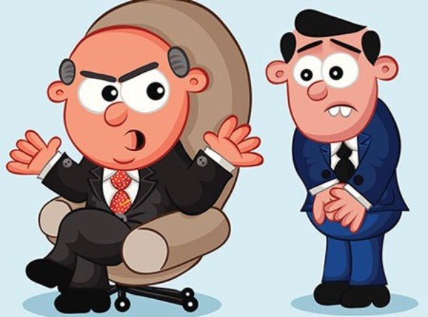 Người quản lý khó tính đang giao tiếp với nhân viên trong môi trường công sở
